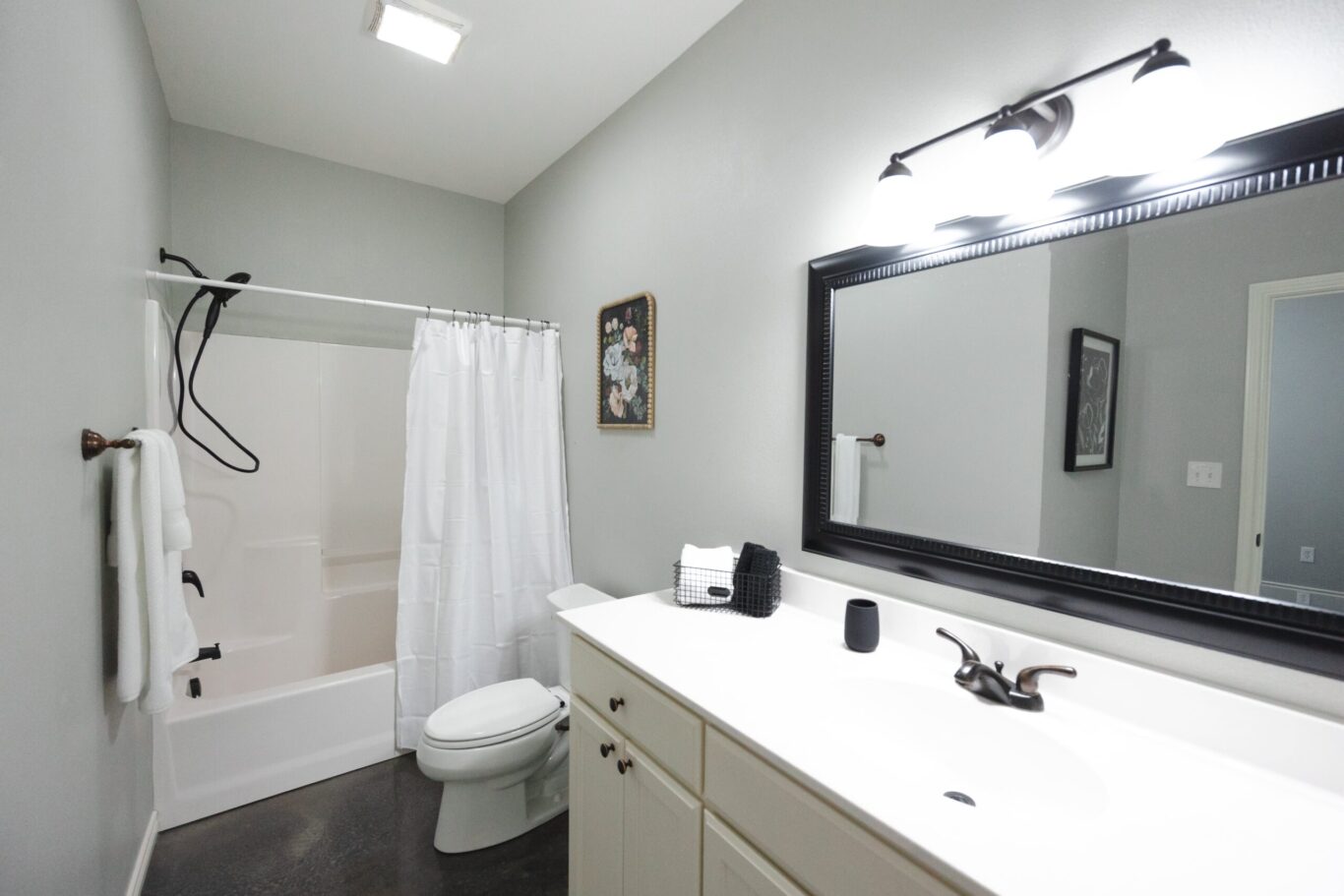bathroom with shower and vanity